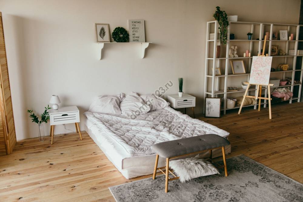 white-wooden-shelf-beside-bed-2062431(1)